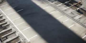 砸物业车位会被判刑吗？